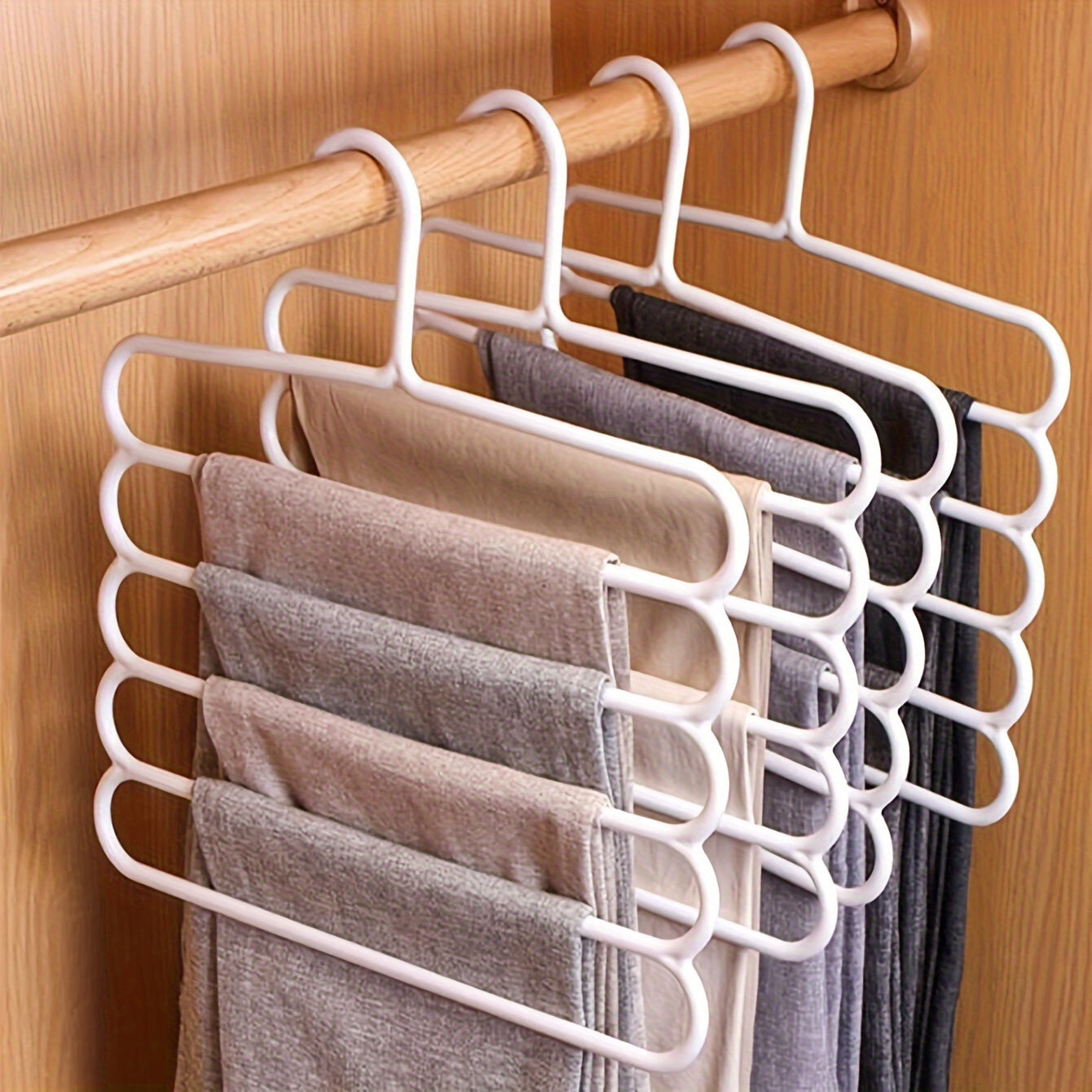 Space-Saving Multi-Layer Pants Rack - Anti-Slip, Adjustable Design for Clothes, Scarves & Accessories - Durable Plastic Wardrobe Organizer for Closet and Laundry Room