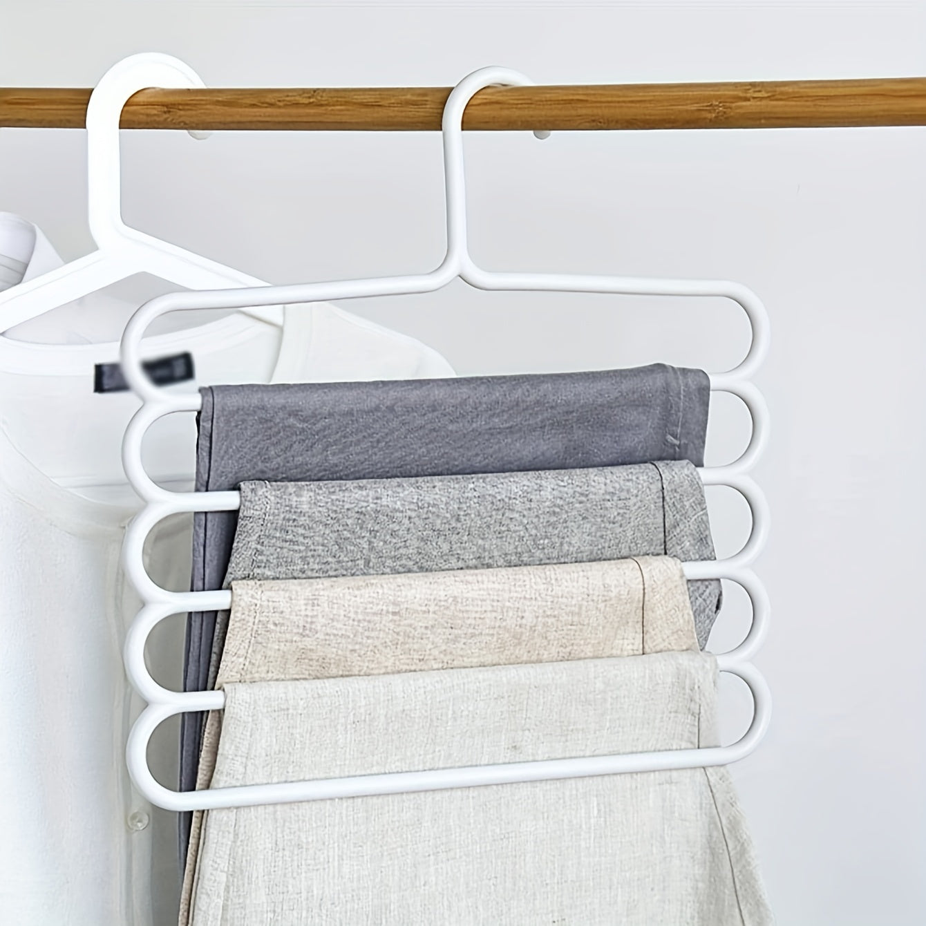 Space-Saving Multi-Layer Pants Rack - Anti-Slip, Adjustable Design for Clothes, Scarves & Accessories - Durable Plastic Wardrobe Organizer for Closet and Laundry Room